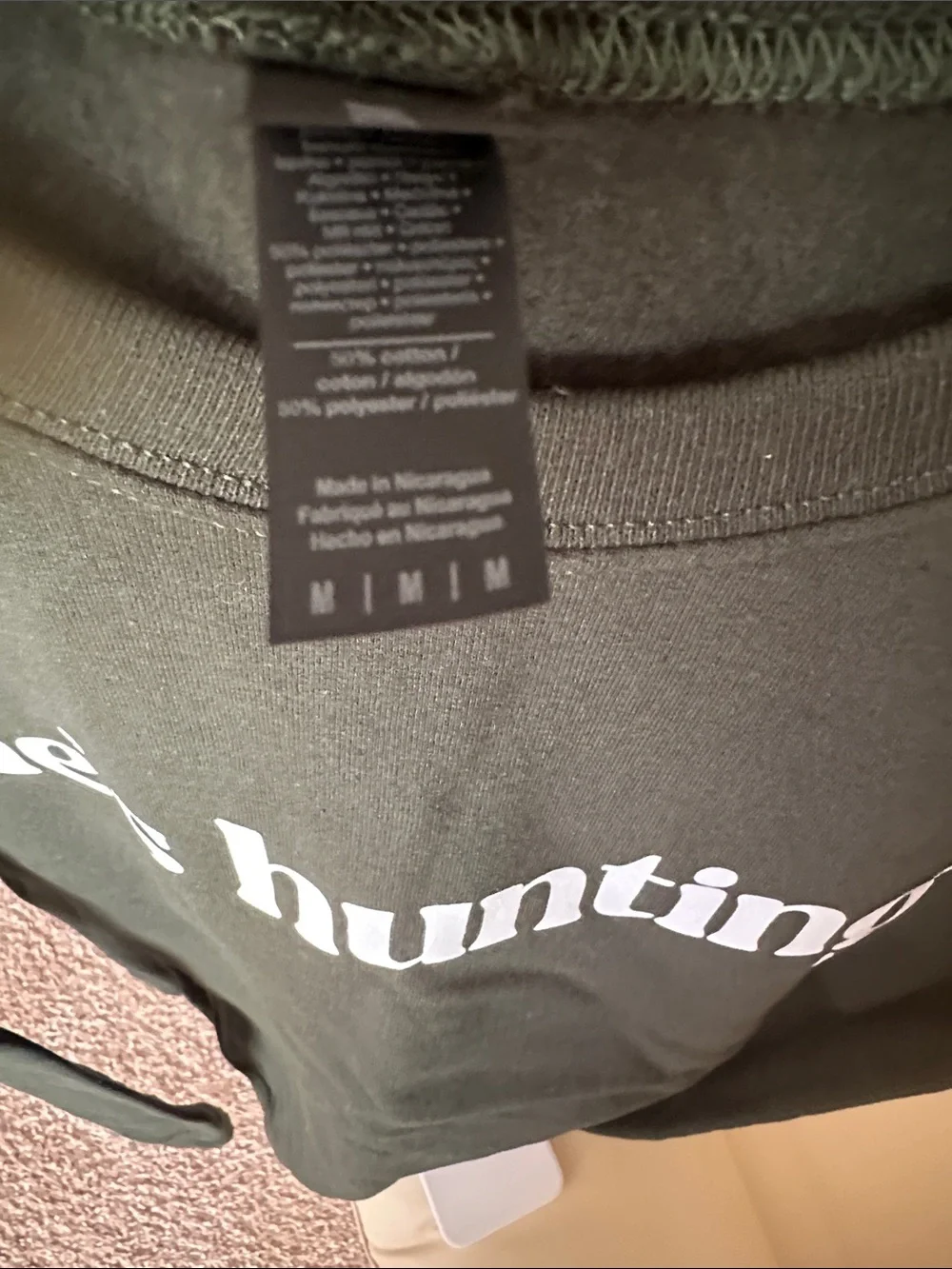 Who’s Hunting…get comfy in this money green Gildan sweatshirt, always on trend.